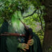 Green Man playing pipes